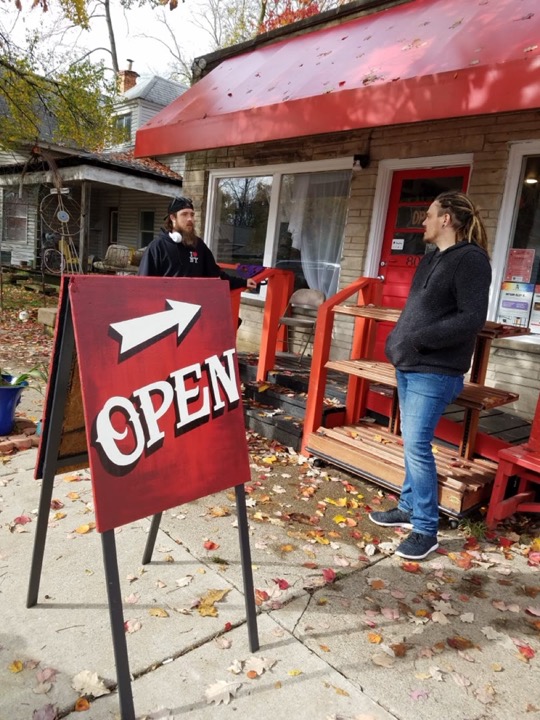 Hand-painted red Open sidewalk sign
