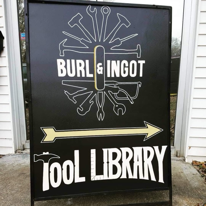 Burl and Ingot Tool Library sidewalk sign painted by Journey Hallows