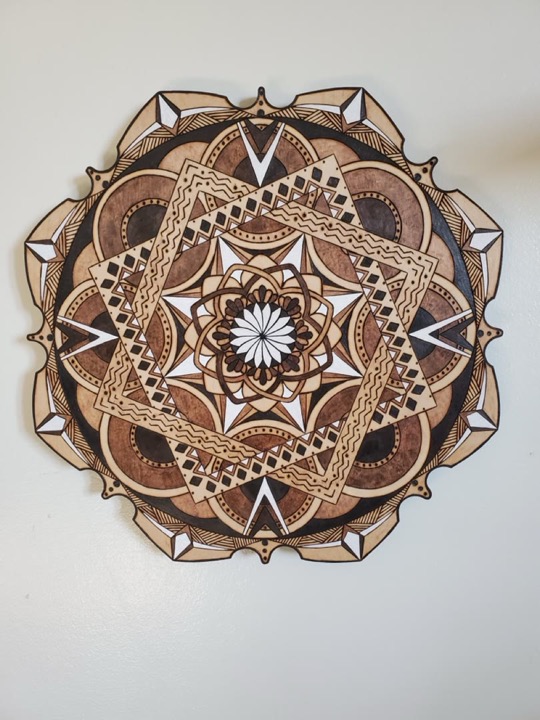 Hand-burned geometric wood mandala by Journey Hallows