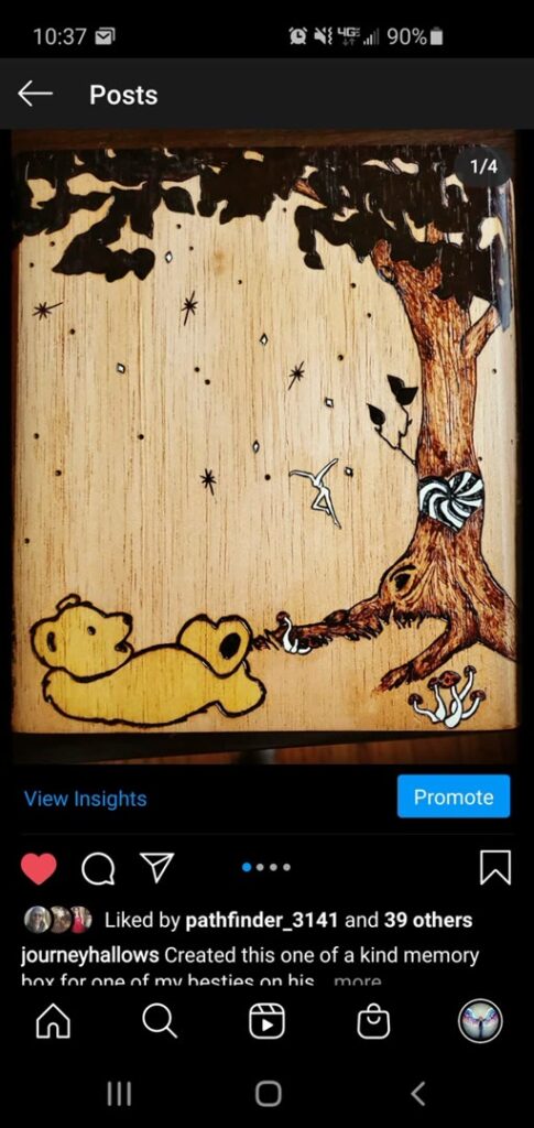 Hand-burned wooden memory box with a bear tree birds and stars
