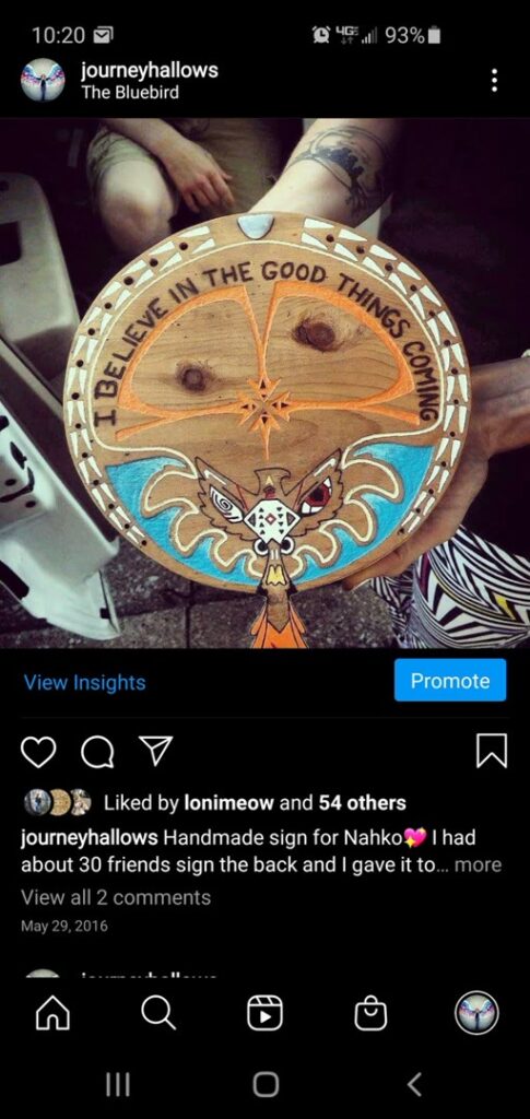 Round handmade wood sign with a bird motif and the words I believe in the good things coming