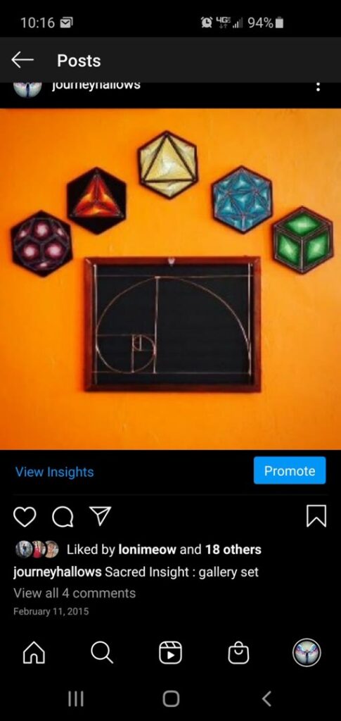 Five colorful geometric wall pieces arranged above a framed golden-ratio drawing