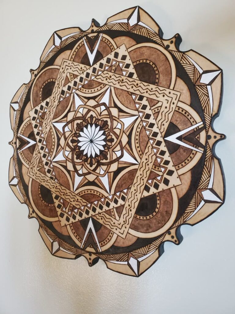 Detailed geometric wood mandala installed on a wall